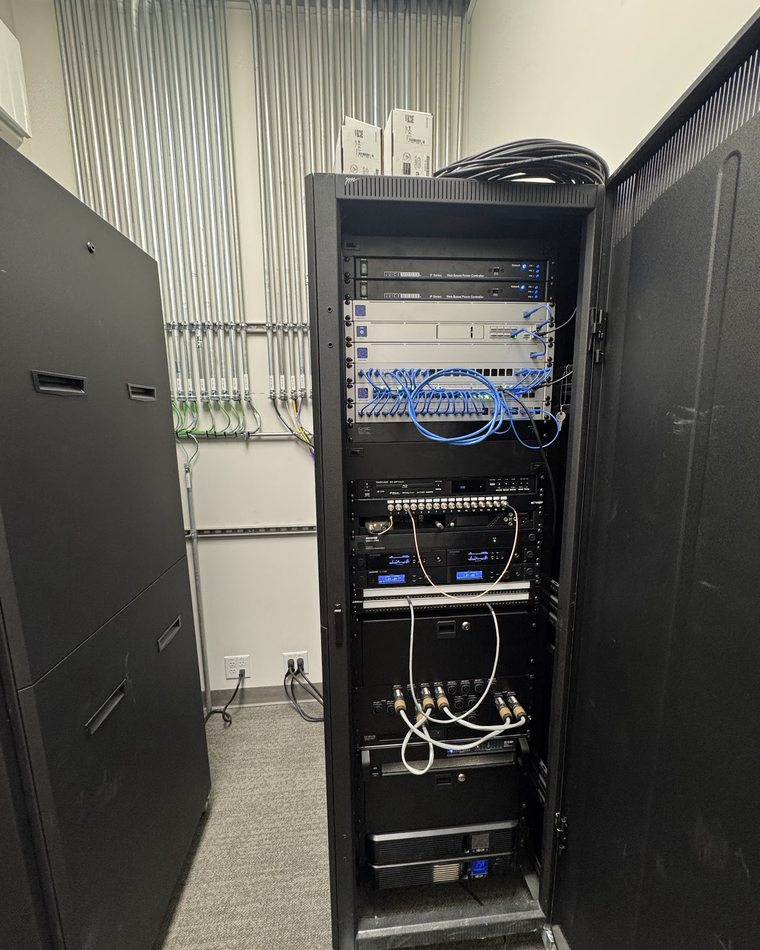 Head-end rack with networked power controllers, patch panels, DSP, wireless receivers and amplifiers